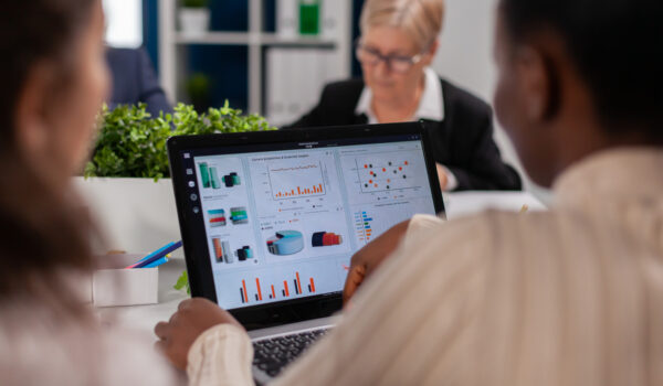 business professionals collaborating on a laptop i 2026 01 08 02 12 54 utc