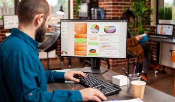 man analyzes business data 1254x738 1